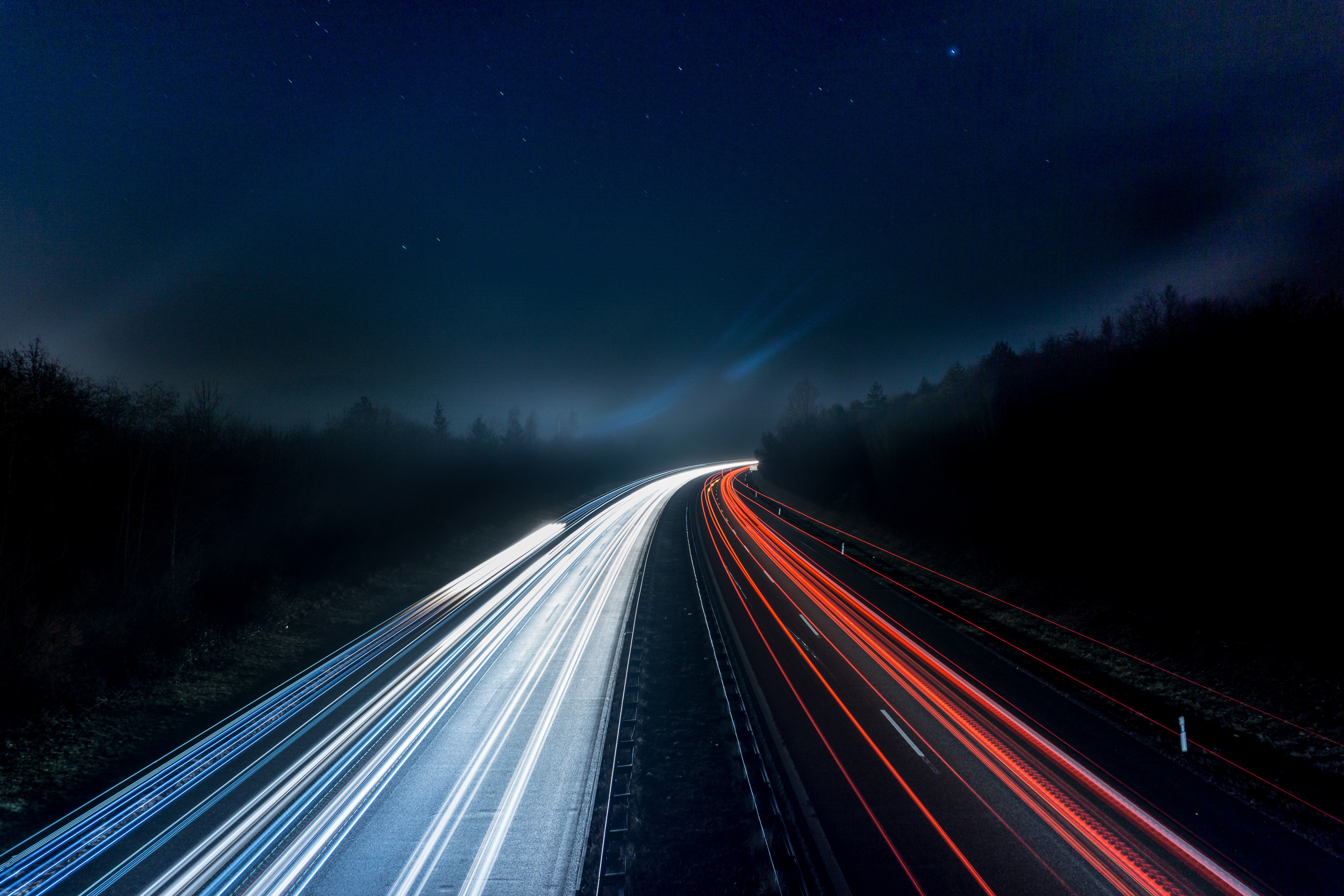 A long exposure of a highway at night.